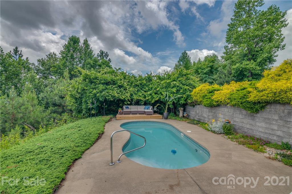 281 Big Rock Road Bostic, NC 28018 - Photo 46 of 48 a view of a swimming pool with a yard