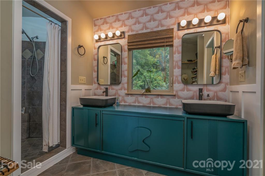 281 Big Rock Road Bostic, NC 28018 - Photo 8 of 48 a bathroom with a sink mirror and window