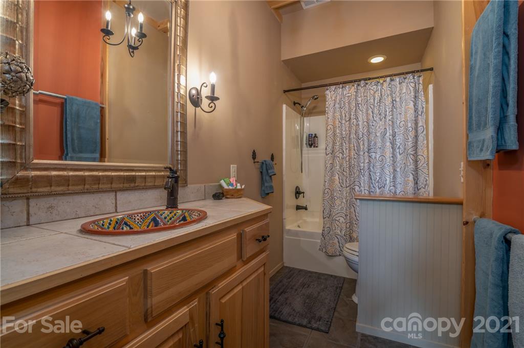 281 Big Rock Road Bostic, NC 28018 - Photo 10 of 48 a bathroom with a sink and a mirror
