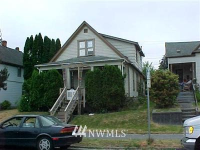 2316 Rockefeller Avenue Everett, WA 98201 - Photo 1 of 1 a front view of a house with a garden