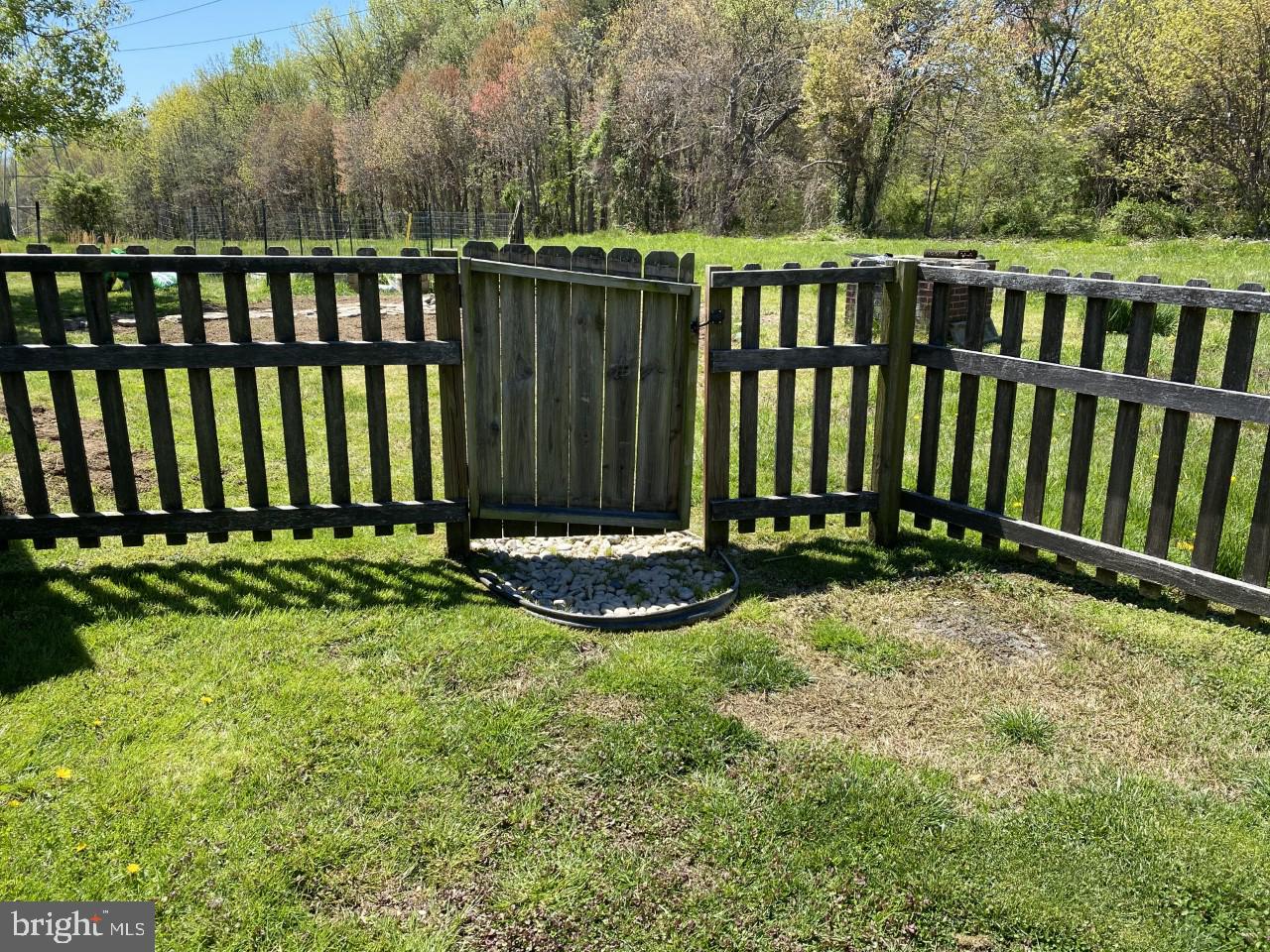 26 Cliffwood Road Baltimore, MD 21206 - Photo 19 of 23 Fence with Gate to Open Space