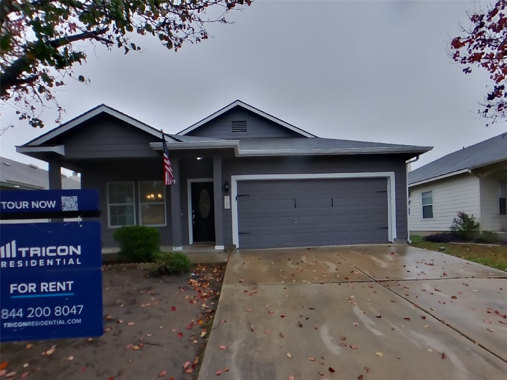 a view of a house with a garage
