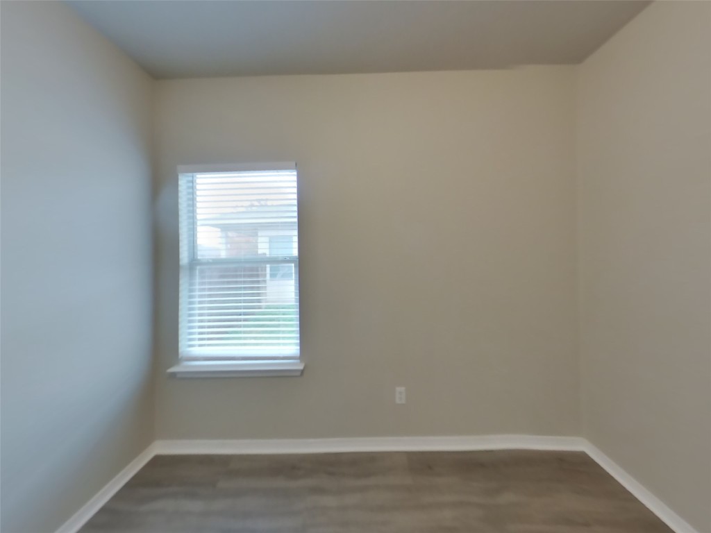 11602 Morgan's Point Street Manor, TX 78653 - Photo 13 of 17 a view of an empty room with a window