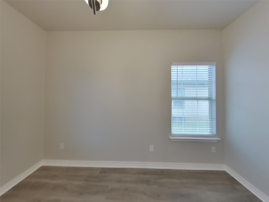 11602 Morgan's Point Street Manor, TX 78653 - Photo 5 of 17 an empty room with a window
