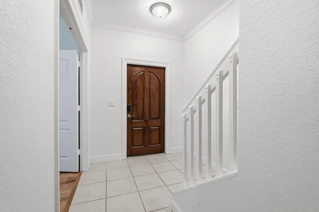 a view of an entryway with staircase