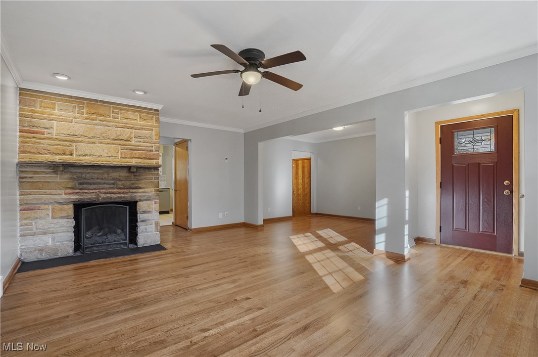 3768 Greenfield Road Uniontown, OH 44685 - Photo 3 of 38 fantastic family room with a brick fireplace