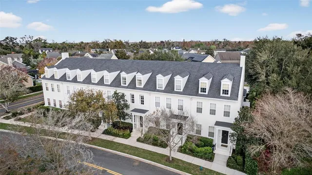 a view of a street with a building in the background