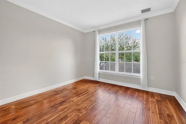 a view of a hallway with washer and dryer