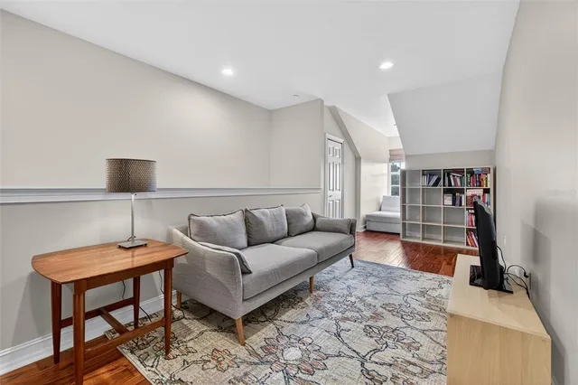 a bedroom with a bed and dresser