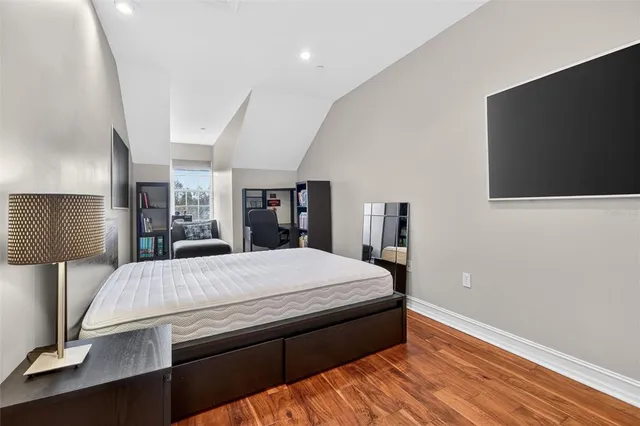 a bathroom with a sink vanity mirror and toilet