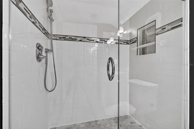 a view of a chairs and table in a patio