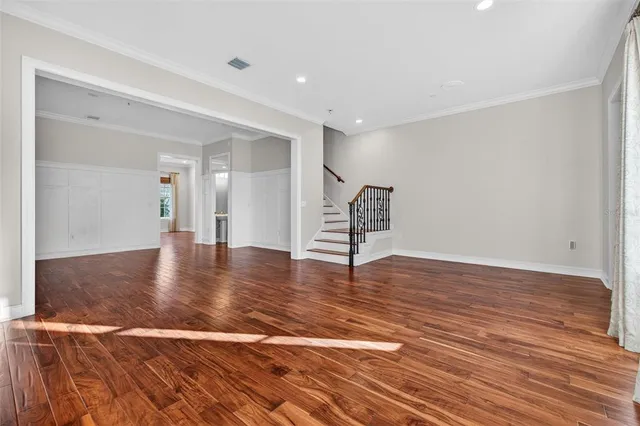 a view of a livingroom with wooden floor