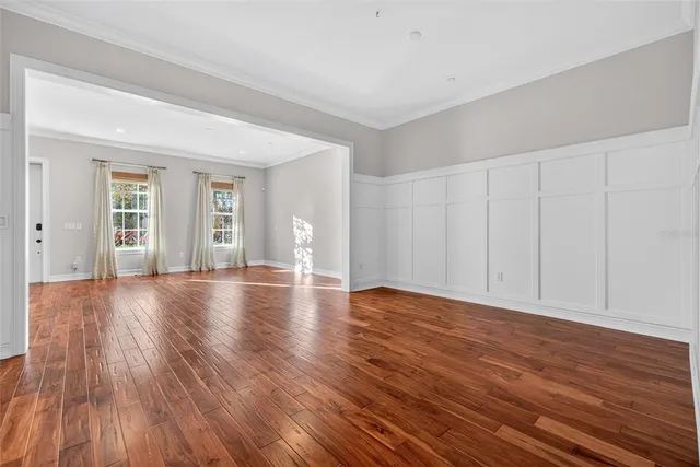 a view of a livingroom with wooden floor
