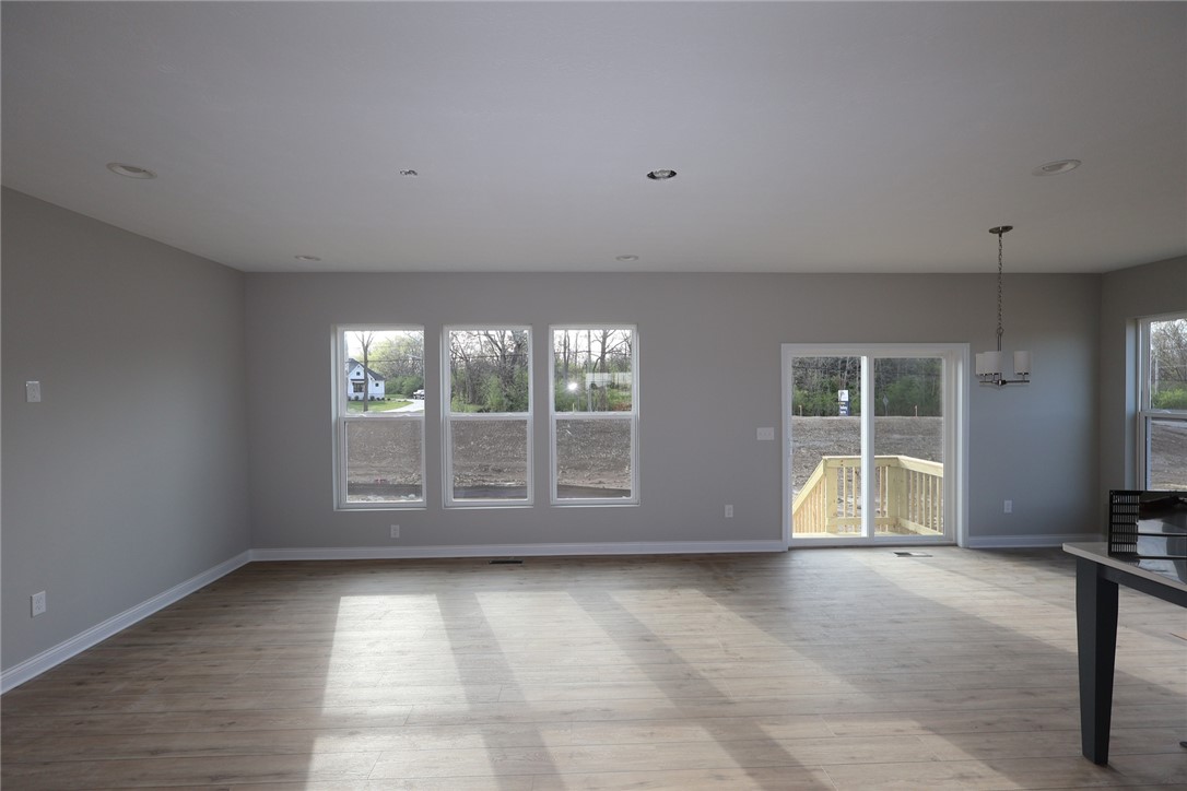 230 Tilly Court, Unit 4 Springboro, OH 45066 - Photo 4 of 20 This expansive great room offers abundant natural light and seamless indoor-outdoor living.