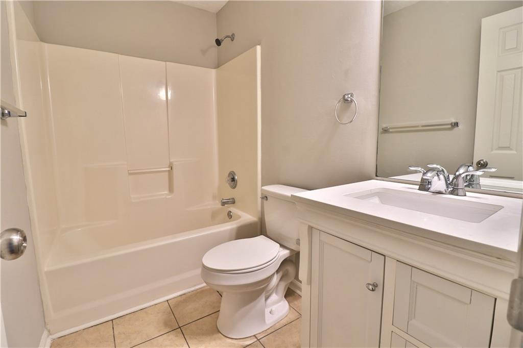 353 Fall View Court Winder, GA 30680 - Photo 45 of 61 a bathroom with a sink a toilet and shower