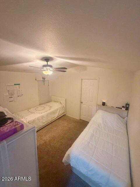 16225 North Cave Creek Road, Unit 31 Phoenix, AZ 85032 - Photo 12 of 33 a bedroom with a bed and cabinets