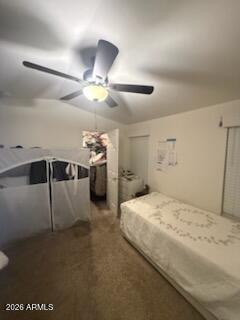 16225 North Cave Creek Road, Unit 31 Phoenix, AZ 85032 - Photo 13 of 33 a spacious bedroom with a bed and a chandelier