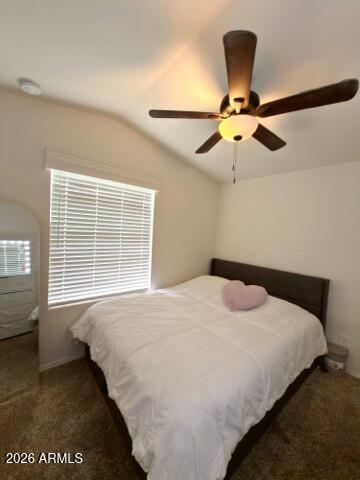 16225 North Cave Creek Road, Unit 31 Phoenix, AZ 85032 - Photo 14 of 33 a bedroom with a bed and a window
