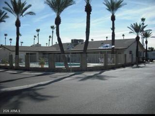 16225 North Cave Creek Road, Unit 31 Phoenix, AZ 85032 - Photo 20 of 33 a view of a street with a large tree