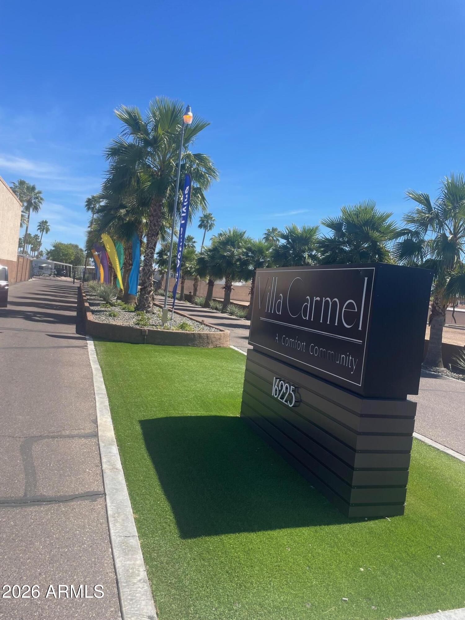 16225 North Cave Creek Road, Unit 31 Phoenix, AZ 85032 - Photo 32 of 33 a view of a garden with an outdoor space