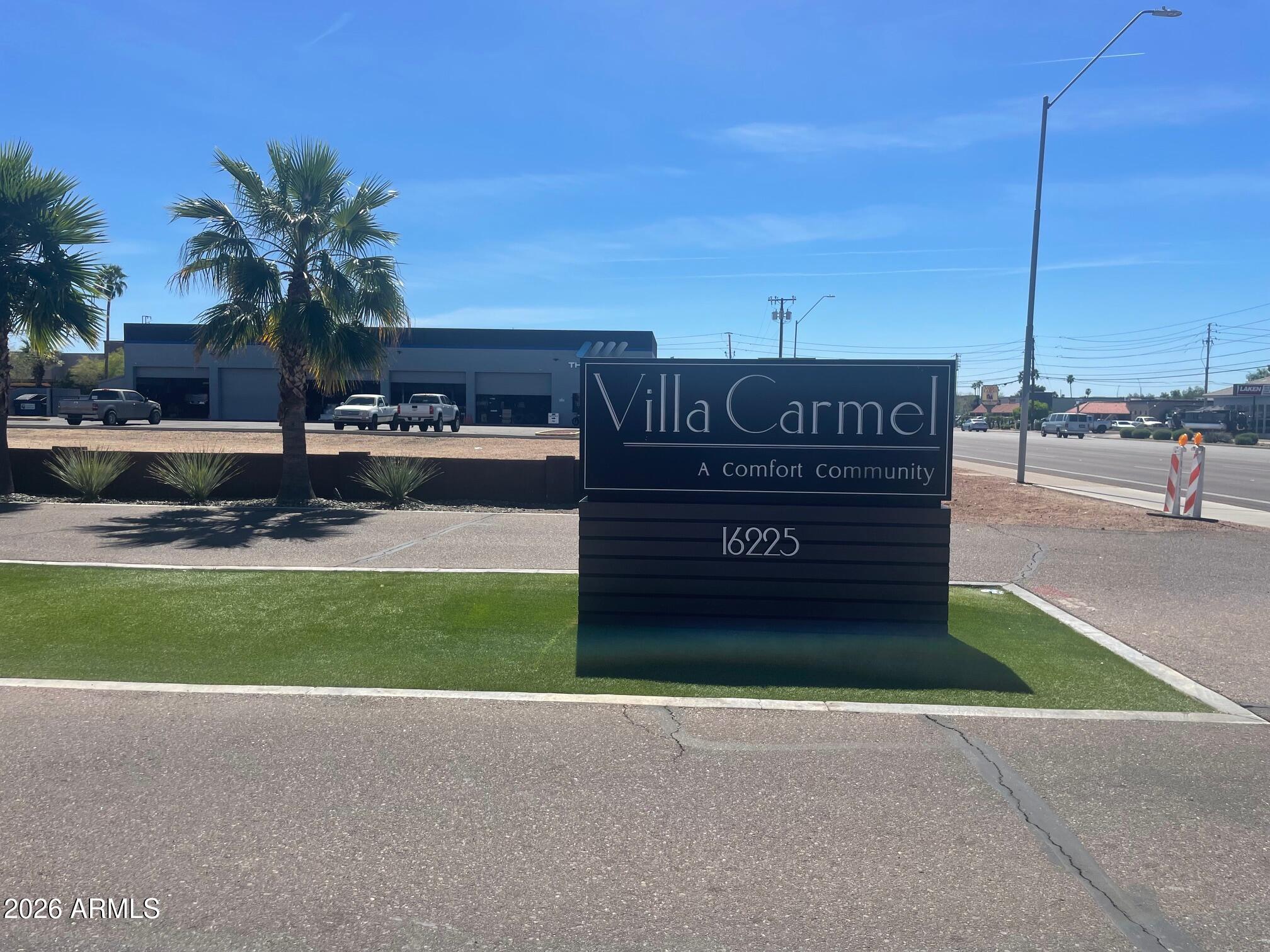 16225 North Cave Creek Road, Unit 31 Phoenix, AZ 85032 - Photo 33 of 33 a sign board with a yard