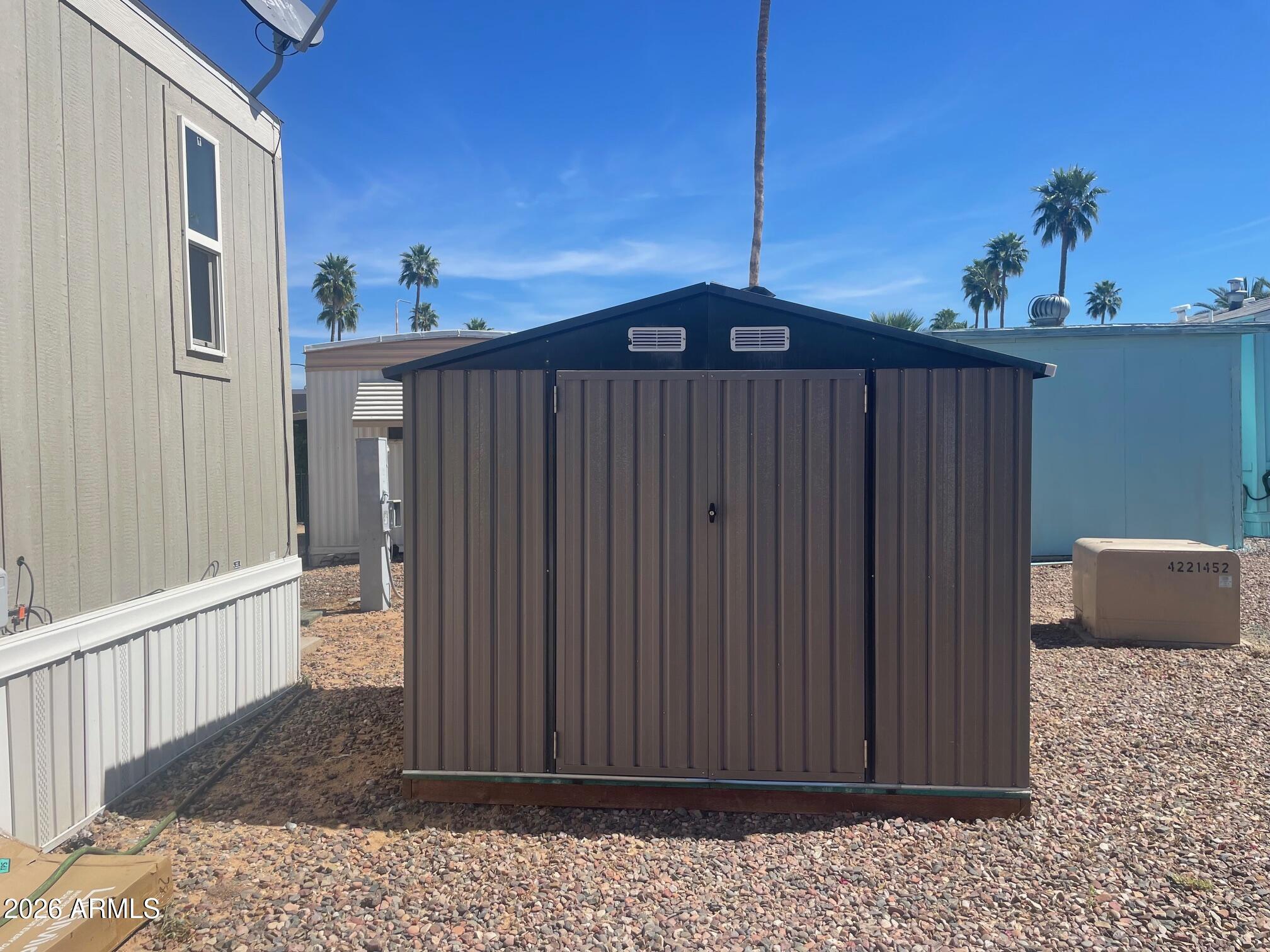 16225 North Cave Creek Road, Unit 31 Phoenix, AZ 85032 - Photo 7 of 33 a view of a house with wooden fence