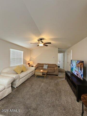 16225 North Cave Creek Road, Unit 31 Phoenix, AZ 85032 - Photo 10 of 33 a living room with furniture and a flat screen tv