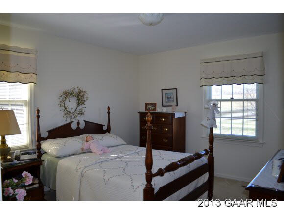 643 Old White Bridge Road Waynesboro, VA 22980 - Photo 11 of 15 a bedroom with a bed and a window