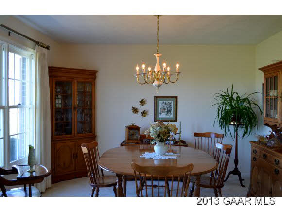 643 Old White Bridge Road Waynesboro, VA 22980 - Photo 5 of 15 a view of a dining room with furniture and chandelier