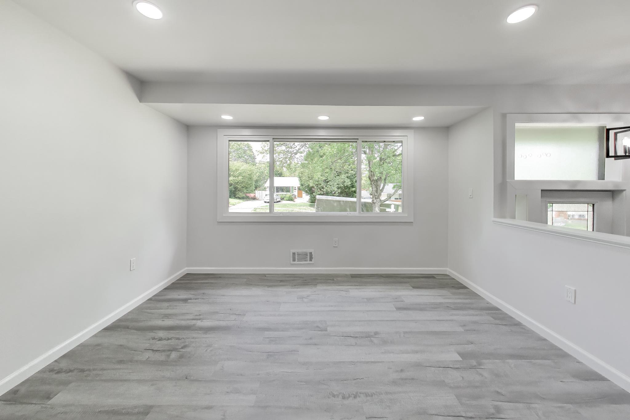 810 Malta Lane Silver Spring, MD 20901 - Photo 7 of 35 Bright and airy family room awaits.