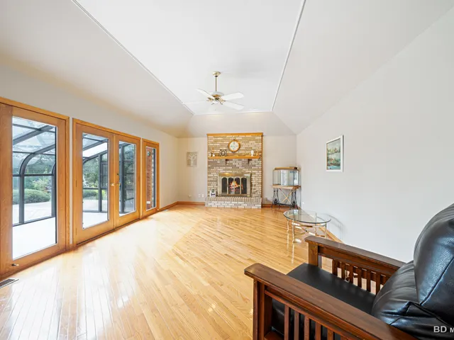 a view of a livingroom with furniture and wooden floor