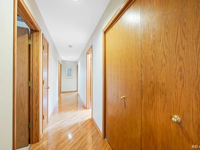 a view of a bathroom from the hallway