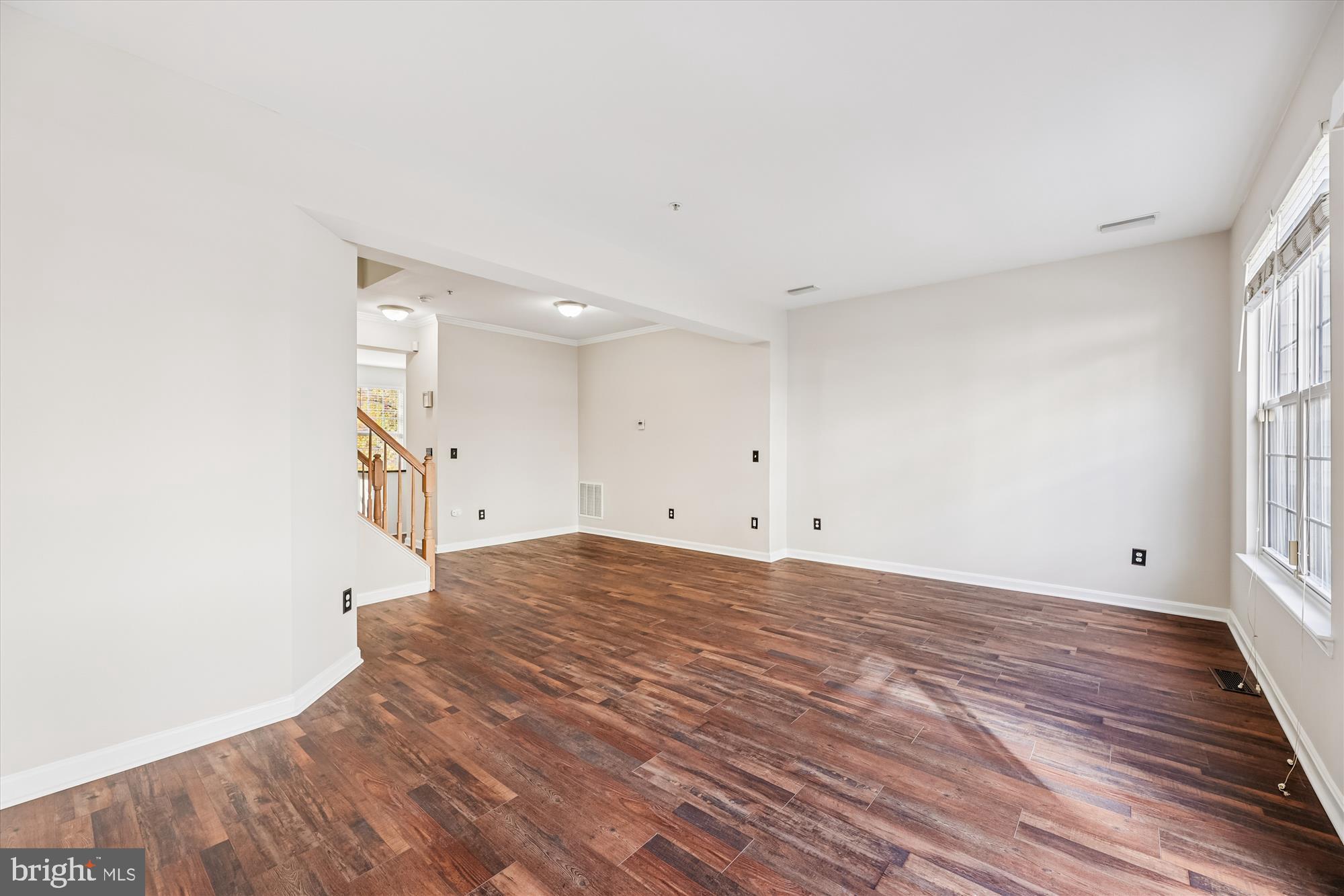 3811 Eisenhower Avenue Alexandria, VA 22304 - Photo 15 of 56 a view of empty room with wooden floor
