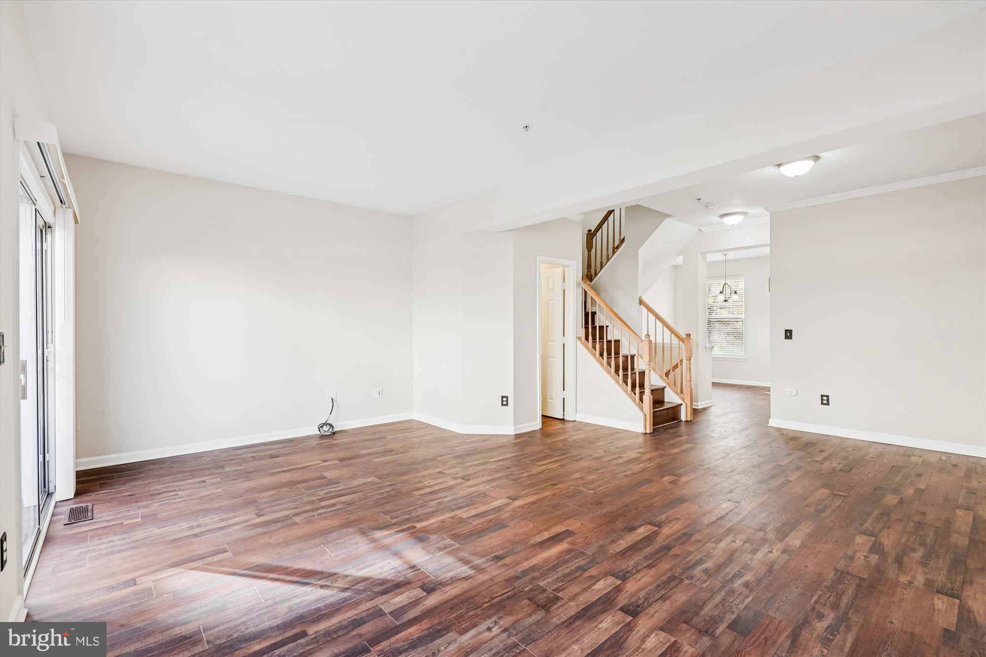 3811 Eisenhower Avenue Alexandria, VA 22304 - Photo 17 of 56 a view of an empty room with wooden floor