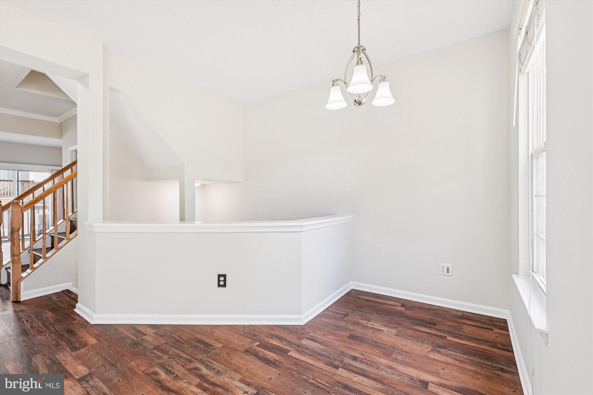 3811 Eisenhower Avenue Alexandria, VA 22304 - Photo 18 of 56 a view of empty room with wooden floor