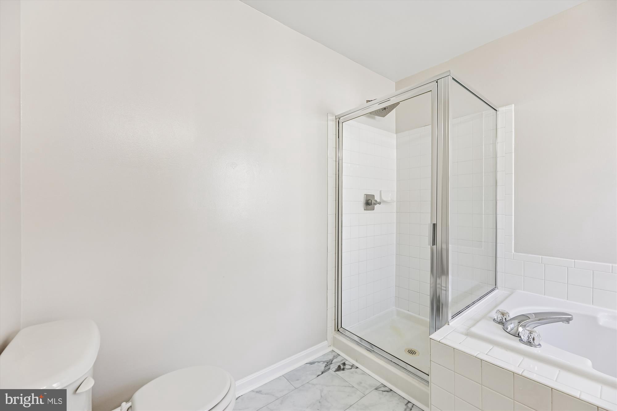 3811 Eisenhower Avenue Alexandria, VA 22304 - Photo 26 of 56 a bathroom with a sink and a toilet