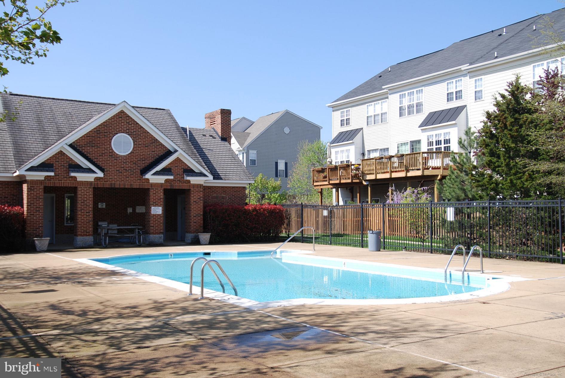 3811 Eisenhower Avenue Alexandria, VA 22304 - Photo 50 of 56 a view of a house with a swimming pool