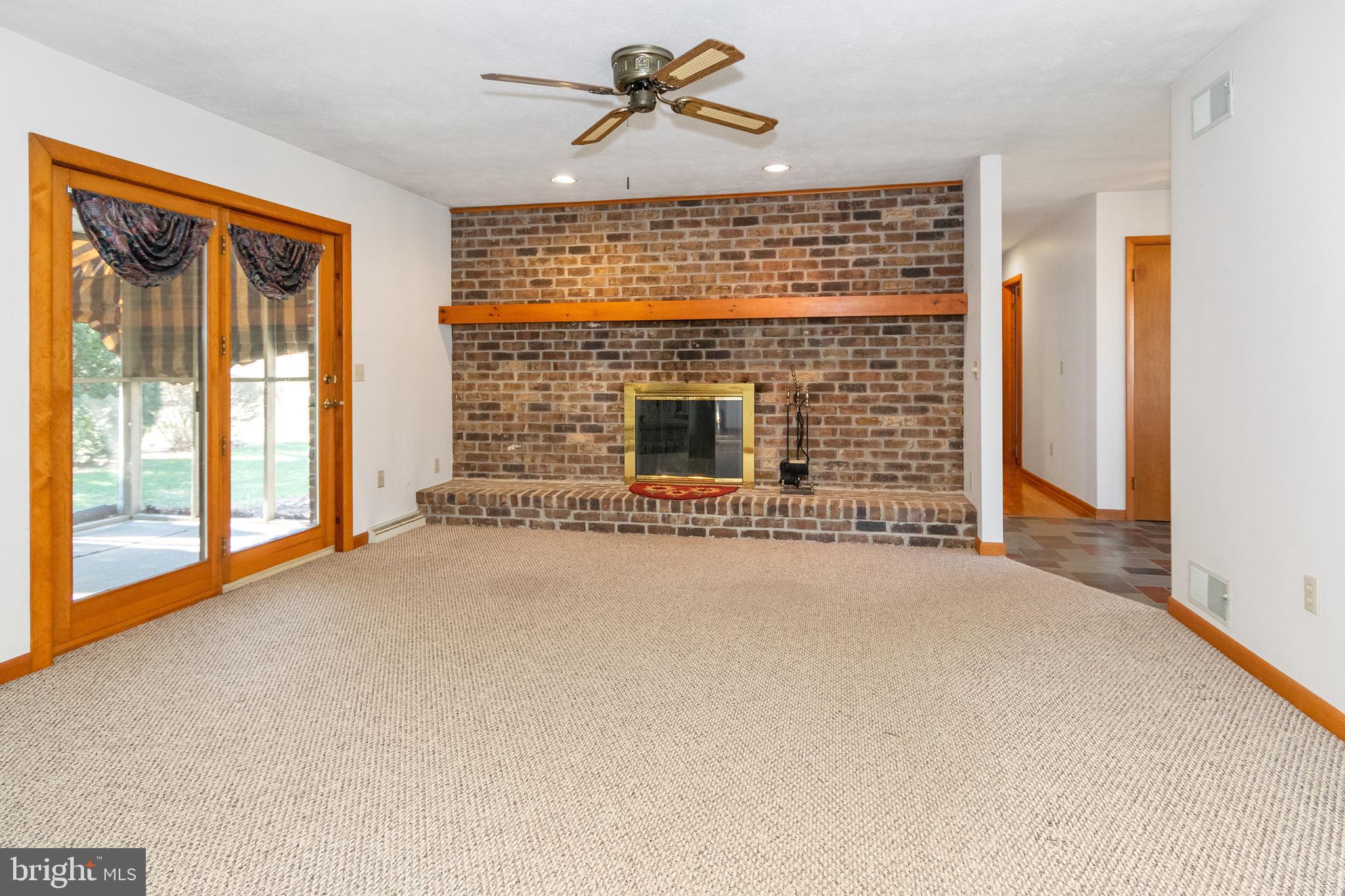11 Strawberry Road New Freedom, PA 17349 - Photo 29 of 33 Family room with wood-burning fireplace