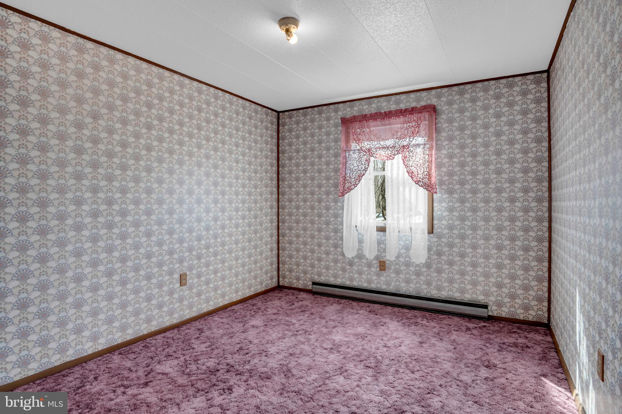 647 North Middle Road Newville, PA 17241 - Photo 13 of 35 a view of a brick wall with exposed radiator