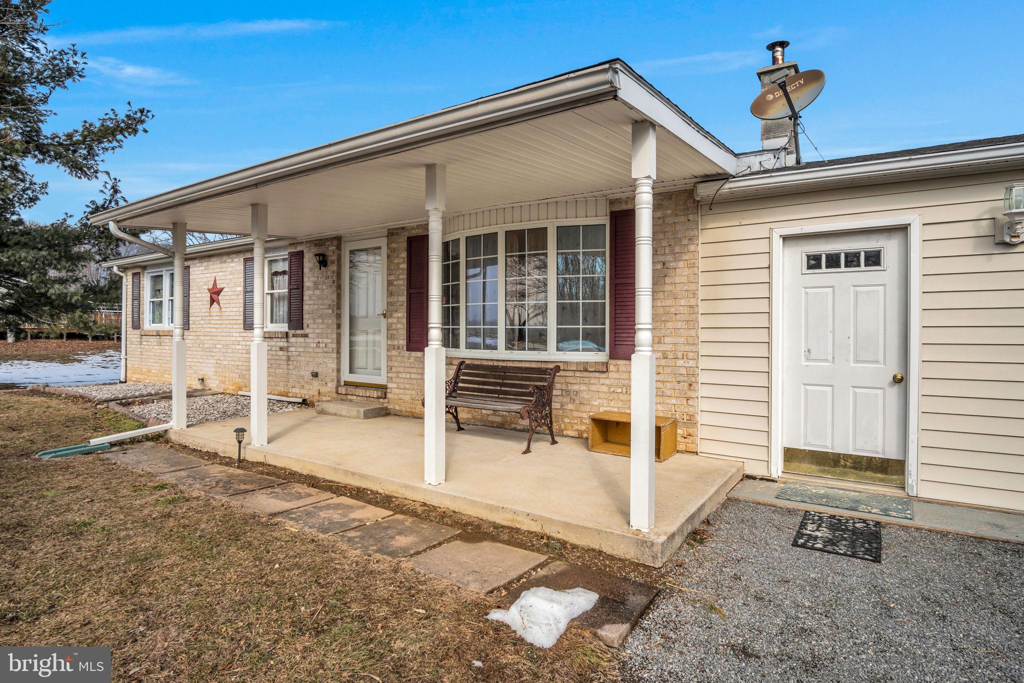 647 North Middle Road Newville, PA 17241 - Photo 2 of 35 front view of a house with a patio