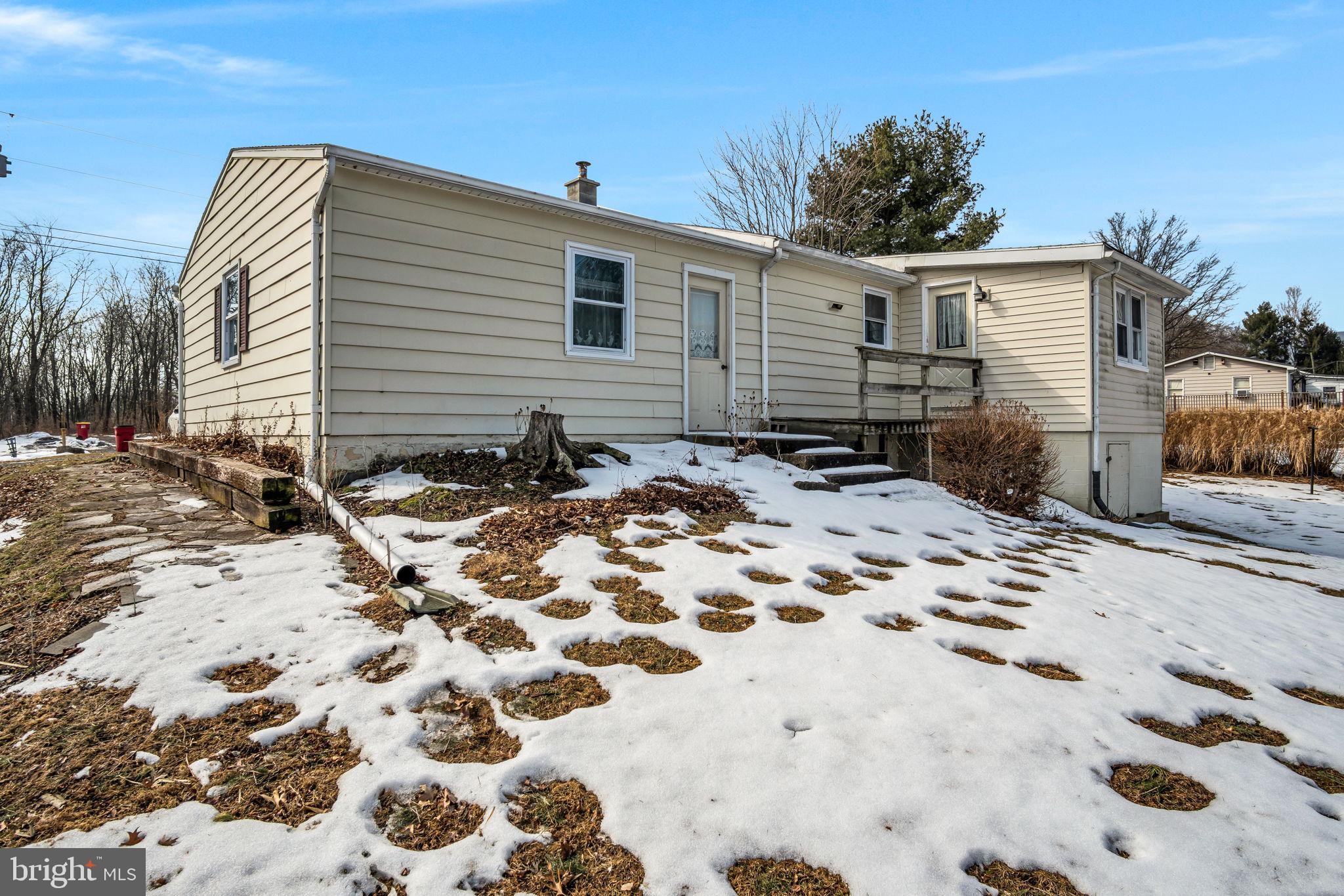 647 North Middle Road Newville, PA 17241 - Photo 29 of 35 a backyard of a house with a barbeque and wooden fence
