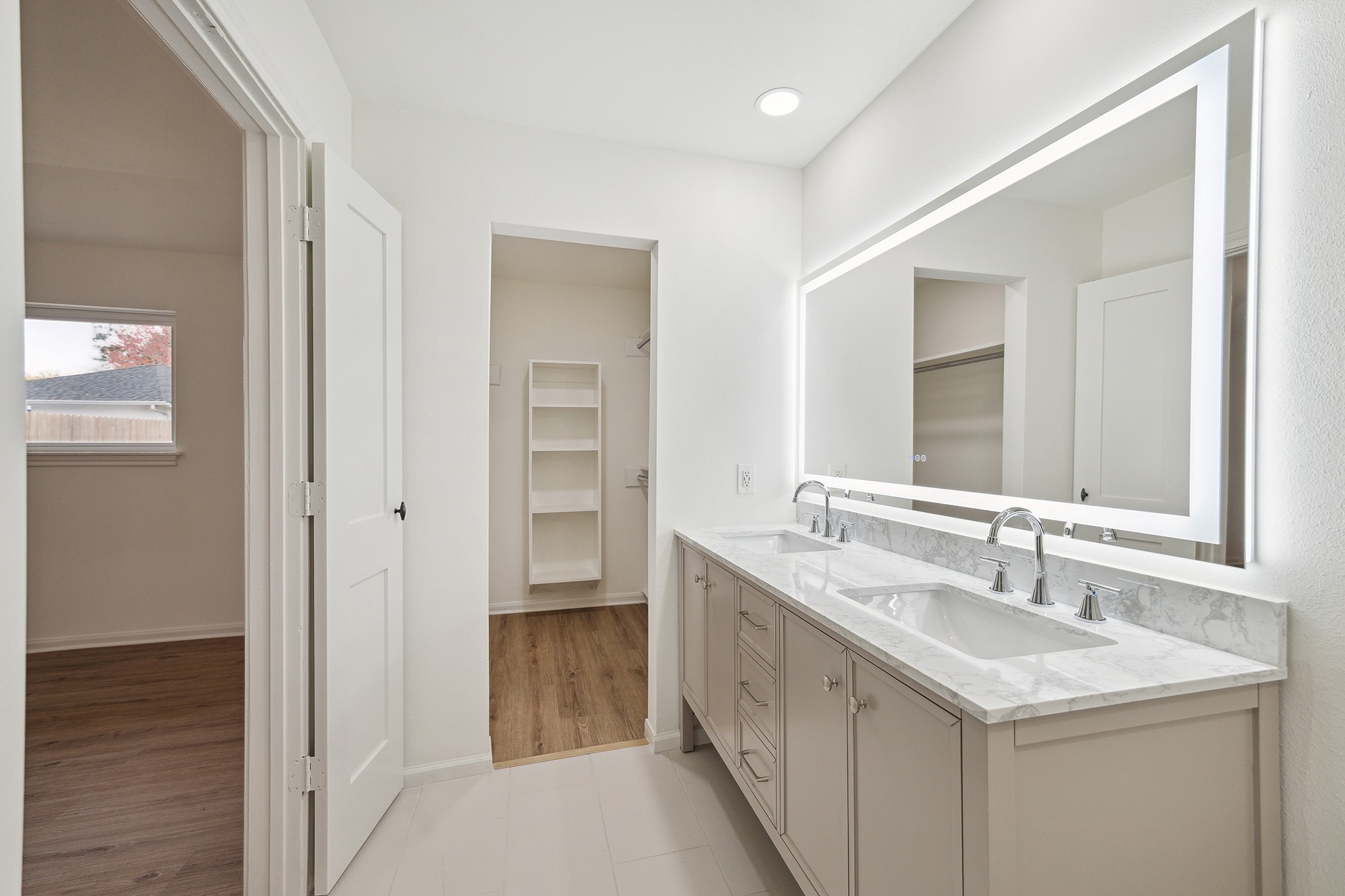 9719 Springmont Drive Houston, TX 77080 - Photo 23 of 32 Master closet is right off master bathroom for ease and convenience!