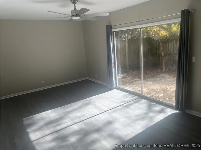 a view of an empty room and window