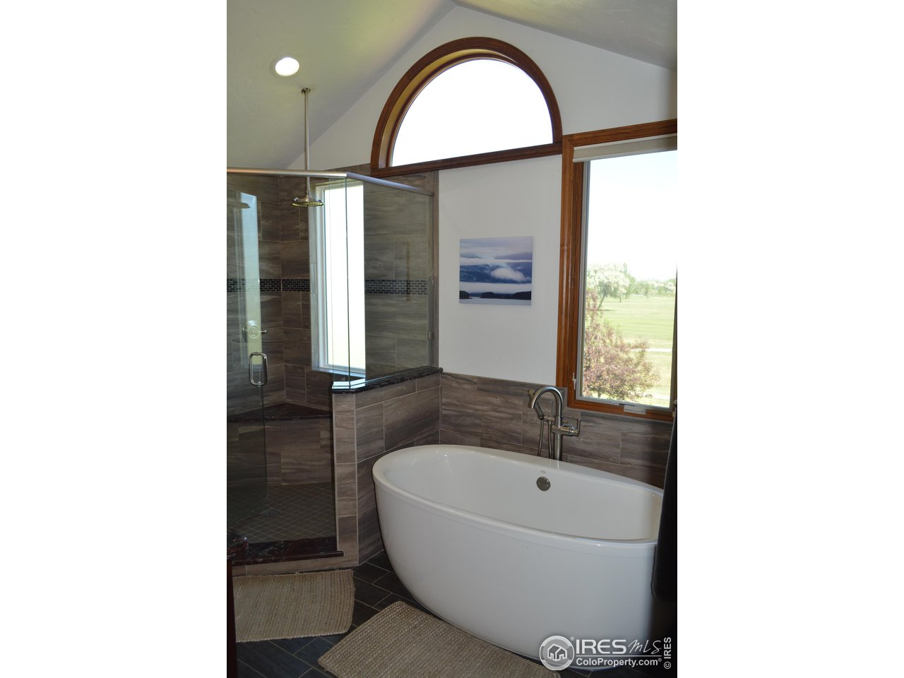 1465 Falcon Ridge Road Eaton, CO 80615 - Photo 31 of 40 Soaker tub, lights on dimmers relaxing!!