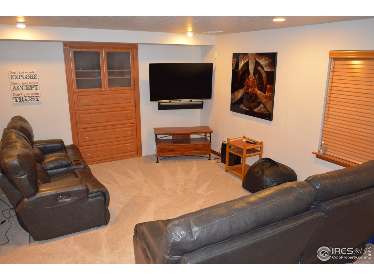1465 Falcon Ridge Road Eaton, CO 80615 - Photo 36 of 40 Cozy family room in basement