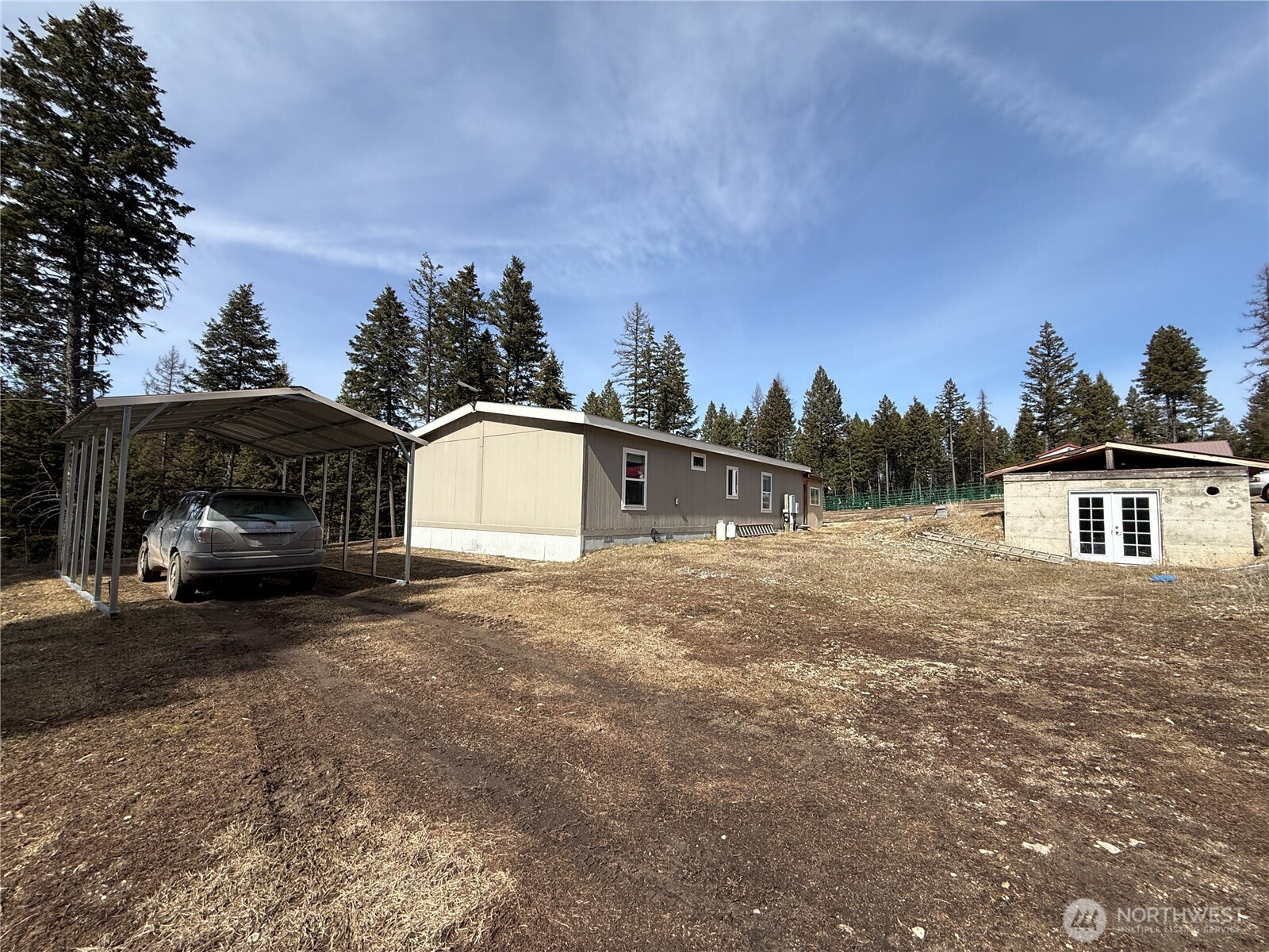 116 Cape Labelle Road Wauconda, WA 98859 - Photo 28 of 35 a house view with a garden space