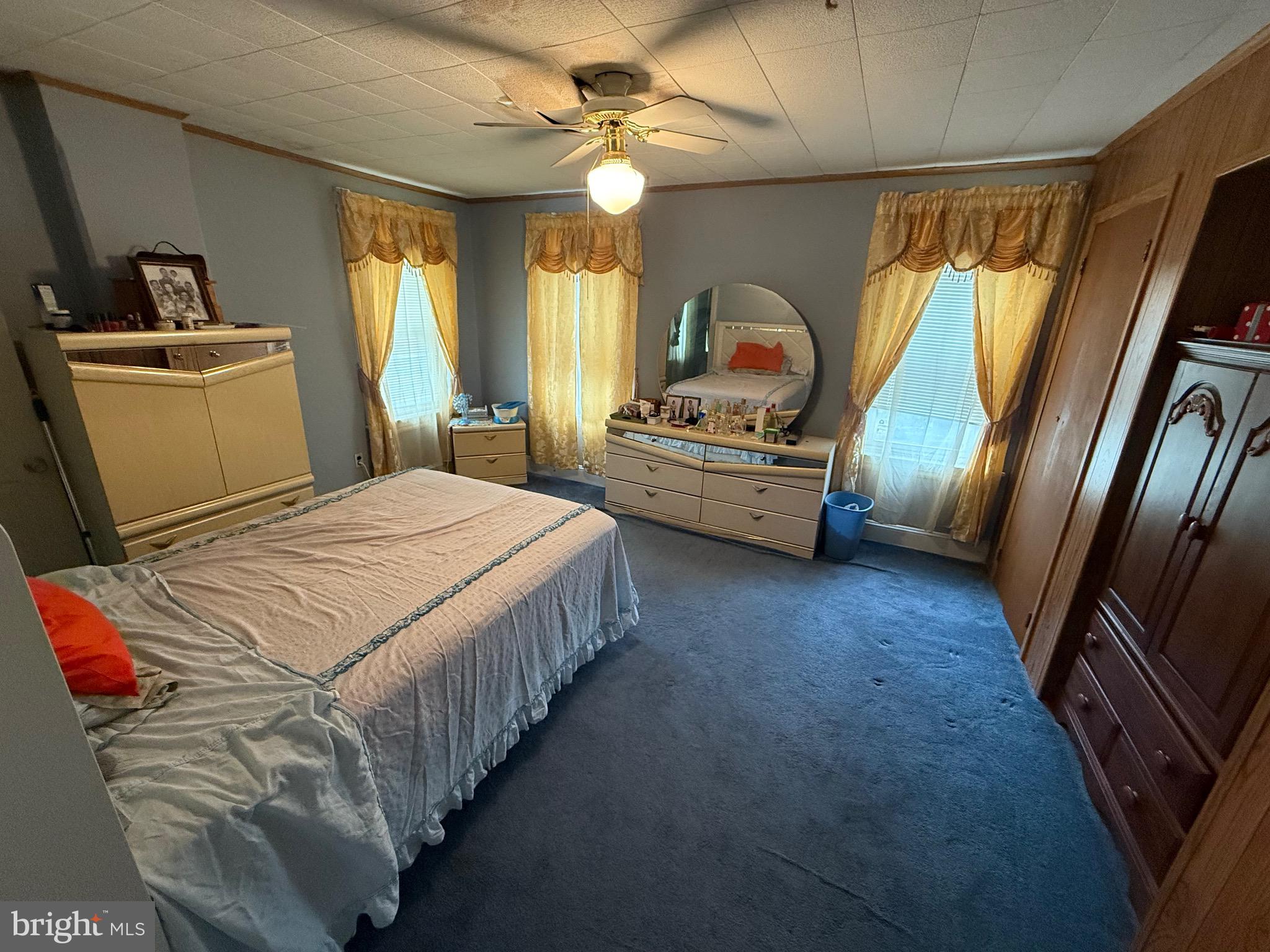 330 Fairview Road Crum Lynne, PA 19022 - Photo 13 of 30 a bedroom with a bed and a large window