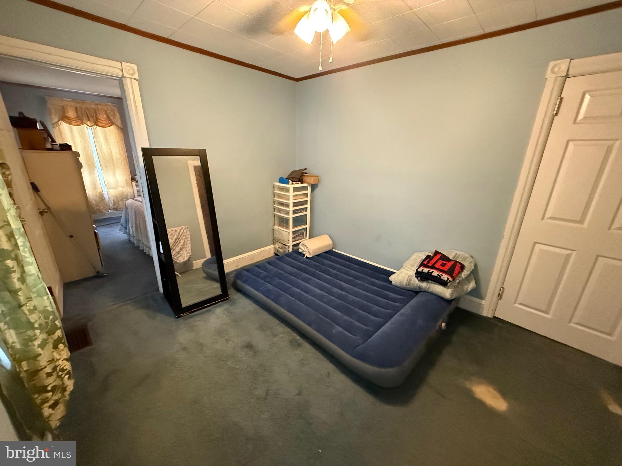 330 Fairview Road Crum Lynne, PA 19022 - Photo 16 of 30 a living room with a couch and a chandelier