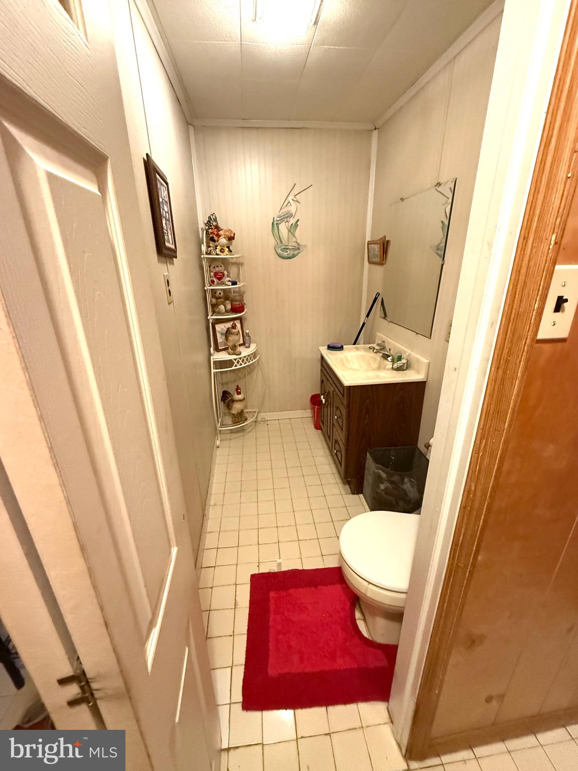330 Fairview Road Crum Lynne, PA 19022 - Photo 8 of 30 a bathroom with a sink and mirror with bathtub