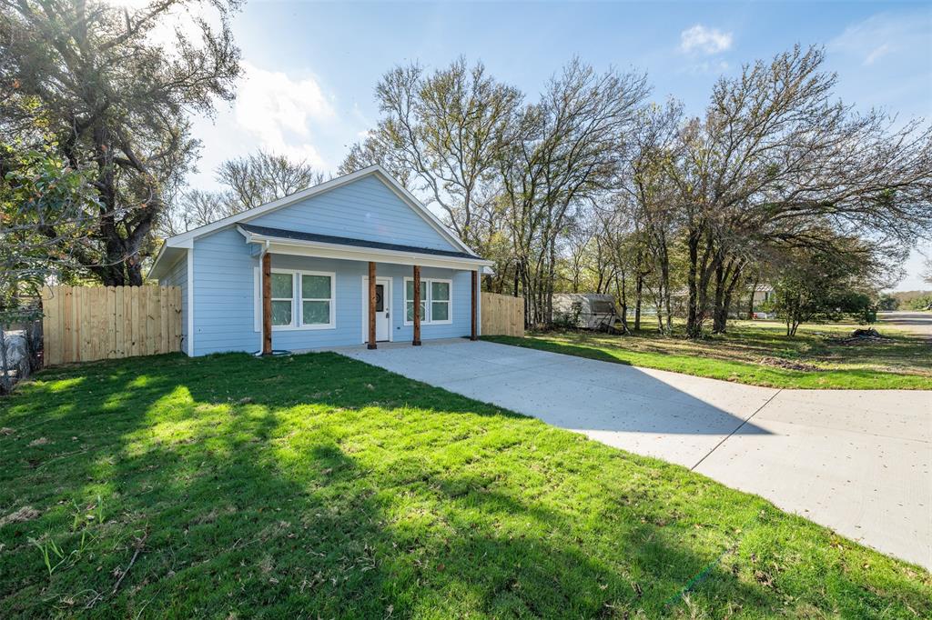 3005 Blackjack Lane Granbury, TX 76048 - Photo 5 of 30 a view of a house with a yard